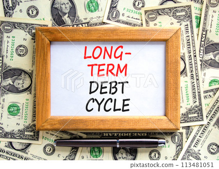 Long-term debt cycle symbol. Concept words Long-term debt cycle on beautiful wooden frame. Black pen. Beautiful dollar bills background. Dollar bills. Business Long-term debt cycle concept. Copy space Long-term debt cycle symbol. Concept words Long-term debt cycle on beautiful wooden frame. Black pen. Beautiful dollar bills background. Dollar bills. Business Long-term debt cycle concept. Copy space 113481051