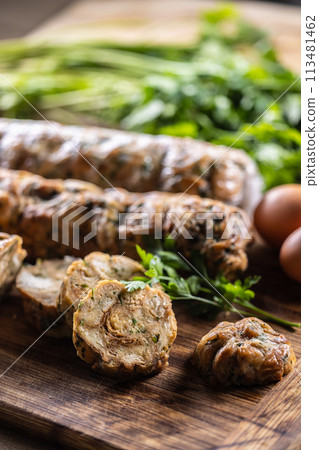 Traditional Czech Karlovy Vary dumplings on a cutting board Traditional Czech Karlovy Vary dumplings on a cutting board 113481462