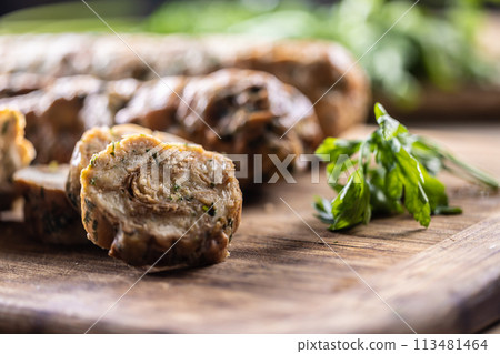 Traditional Czech Karlovy Vary dumplings on a cutting board 113481464