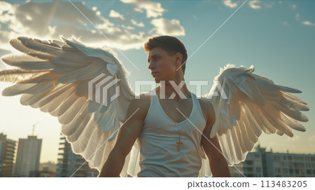 Caucasian male angel with white wings in the city. 113483205