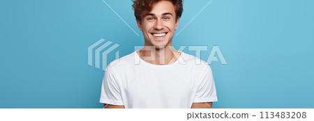 Caucasian man wearing a t-shirt on a blue background. 113483208