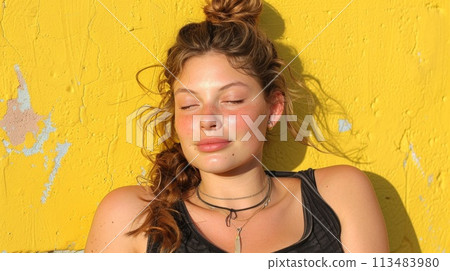A woman with a ponytail and black top laying on her side, AI 113483980