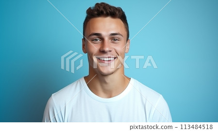 Caucasian man wearing a t-shirt on a blue background. 113484518
