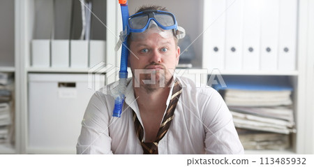 Man wearing suit and tie in goggles with snorkel Man wearing suit and tie in goggles with snorkel 113485932
