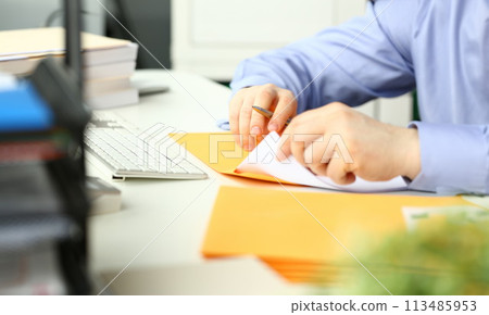 Businessman hold hand yellow mail envelope Businessman hold hand yellow mail envelope 113485953