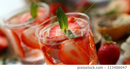 Strawberry punch home made cocktail closeup 113486047