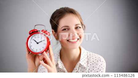 Adult smiling caucasian woman hold red Adult smiling caucasian woman hold red 113486126