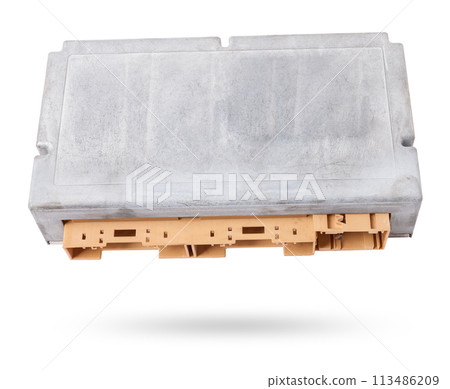 Plastic car engine control unit with metal elements on a white isolated background is the connecting center of various subsystems, units and assemblies. Monitoring the state of the moment. Spare part 113486209
