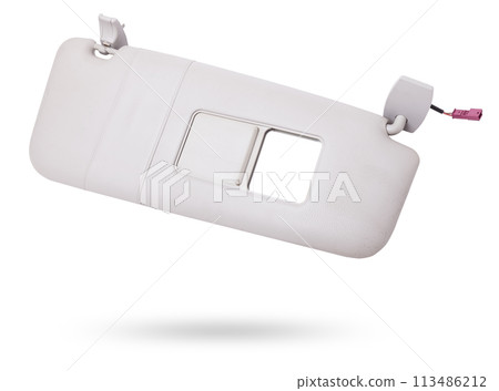 Sun visor with a mirror made of light gray plastic on a white background in a photo studio. Spare part of the car interior for replacement in a car service or for sale on auto dismantling. Sun visor with a mirror made of light gray plastic on a white background in a photo studio. Spare part of the car interior for replacement in a car service or for sale on auto dismantling. 113486212