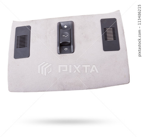 Close-up of roof light control dashboard and sunroof buttons of luxury very expensive new white car in the vehicle repair workshop on white isolated background. Auto service industry. Close-up of roof light control dashboard and sunroof buttons of luxury very expensive new white car in the vehicle repair workshop on white isolated background. Auto service industry. 113486215