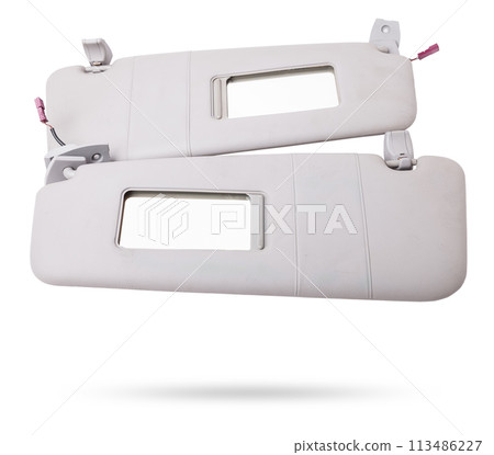 Sun visor with a mirror made of light gray plastic on a white background in a photo studio. Spare part of the car interior for replacement in a car service or for sale on auto dismantling. 113486227
