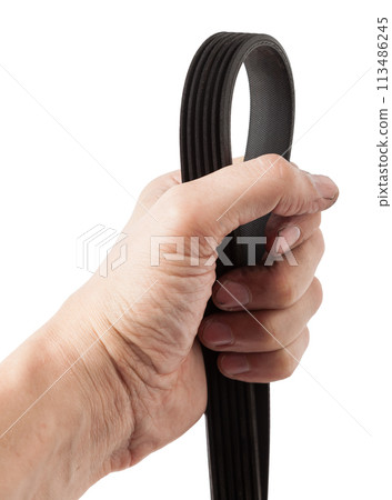 V-ribbed engine belt made of black rubber on a white isolated background in a photo studio of auto parts for replacement during repair or for a catalog of spare parts for sale on auto analysis. V-ribbed engine belt made of black rubber on a white isolated background in a photo studio of auto parts for replacement during repair or for a catalog of spare parts for sale on auto analysis. 113486245