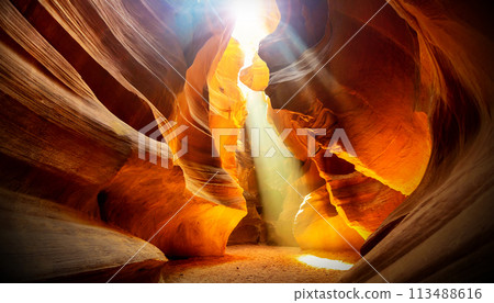 Light Beams and Orange Rock Formations in a Narrow Canyon - Generative Ai 113488616