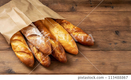 French Baguettes in Paper Bag on a Wooden Background - Generative Ai French Baguettes in Paper Bag on a Wooden Background - Generative Ai 113488867