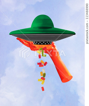 Contemporary art. collage. Hand holding green, hat like UFO dispensing array of gummy bears against cloudy sky, textured background Contemporary art. collage. Hand holding green, hat like UFO dispensing array of gummy bears against cloudy sky, textured background 113488990