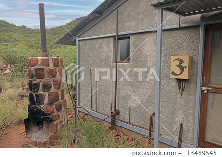 Picture of a historical hot water supply for a house via an external fireplace Picture of a historical hot water supply for a house via an external fireplace 113489545