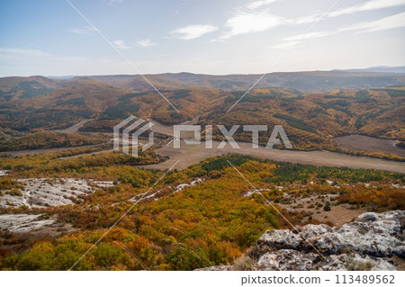 The autumn landscape of the mountain valley is an amazing, beautiful place at any time of the year. Hiking. Nature The autumn landscape of the mountain valley is an amazing, beautiful place at any time of the year. Hiking. Nature 113489562