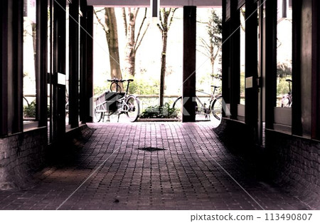 red bicycle on the street 113490807