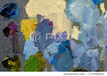 Oil paints applied to a palette 113490891