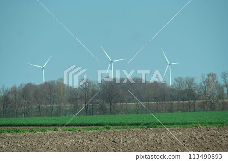 wind turbine farm in the field 113490893