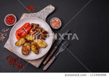 Delicious juicy grilled vegetables potatoes, tomatoes, peppers, eggplant 113490996