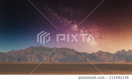 Majestic night sky with the Milky Way over desert mountains and isolated palm trees. Majestic night sky with the Milky Way over desert mountains and isolated palm trees. 113492236