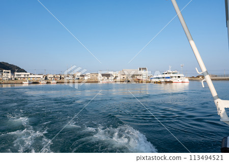 Taking a ferry from Shikanoshima to Hakata Wharf. Shikanoshima in the background (Fukuoka City, Fukuoka Prefecture) Taking a ferry from Shikanoshima to Hakata Wharf. Shikanoshima in the background (Fukuoka City, Fukuoka Prefecture) 113494521