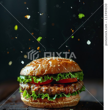 Yummy Burger with Dynamic Particles on Background. Fast Food Advertising Concept 113494830