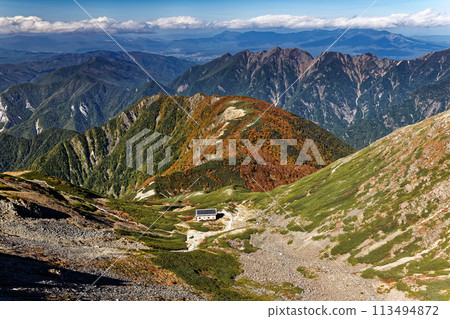 Senjo-goya hut and Umanose seen from Mount Senjo in the Southern Alps Senjo-goya hut and Umanose seen from Mount Senjo in the Southern Alps 113494872