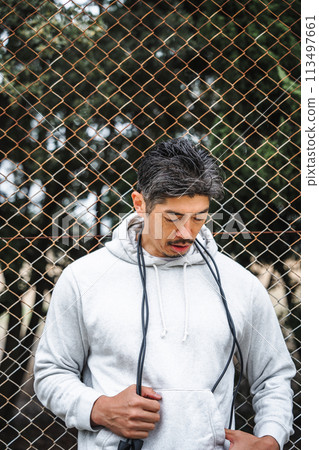 Portrait of a man in his 40s wearing training wear 113497661