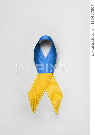 yellow blue ribbon on white background 113497807