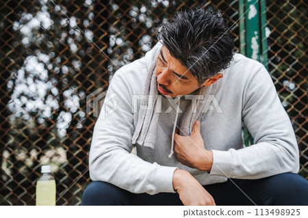 Man taking a rest in the park Man taking a rest in the park 113498925