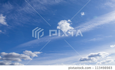 Many white clouds flowing in the blue sky Many white clouds flowing in the blue sky 113498983