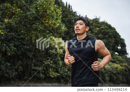 A man in his 40s jogging A man in his 40s jogging 113499214
