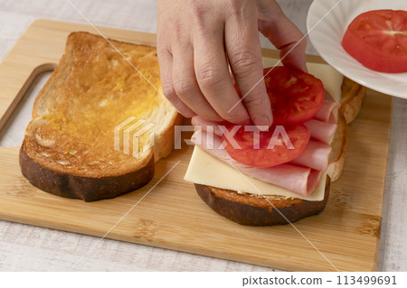Sandwich making process Cheese Tomato Ham Sandwich making process Cheese Tomato Ham 113499691