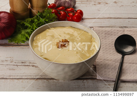 Gourmet cheese soup in the bowl Gourmet cheese soup in the bowl 113499897