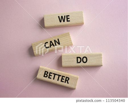 We Can Do Better symbol. Concept words We Can Do Better on wooden blocks. Beautiful pink background. Business and We Can Do Better concept. Copy space. 113504340