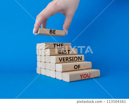 Be the best version of you symbol. Concept words Be the best version of you on wooden blocks. Businessman hand. Beautiful blue background. Business concept. Copy space. 113504381