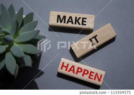 Make it Happen symbol. Concept words Make it Happen on wooden blocks. Beautiful grey background with succulent plant. Business and Make it Happen concept. Copy space. 113504575