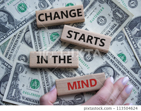 Change starts in the mind symbol. Concept words Change starts in the mind on wooden blocks. Beautiful dollar background. Businessman hand. Business and Change starts in the mind concept. Copy space 113504624