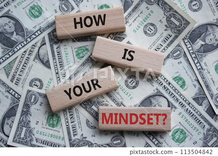 Mindset symbol. Wooden blocks with words How is your Mindset. Beautiful dollar background. Business and How is your Mindset concept. Copy space. Mindset symbol. Wooden blocks with words How is your Mindset. Beautiful dollar background. Business and How is your Mindset concept. Copy space. 113504842