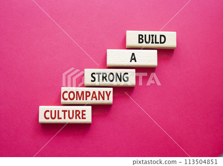Company culture symbol. Wooden blocks with words Build a strong company culture. Beautiful red background. Business and Company culture concept. Copy space. Company culture symbol. Wooden blocks with words Build a strong company culture. Beautiful red background. Business and Company culture concept. Copy space. 113504851