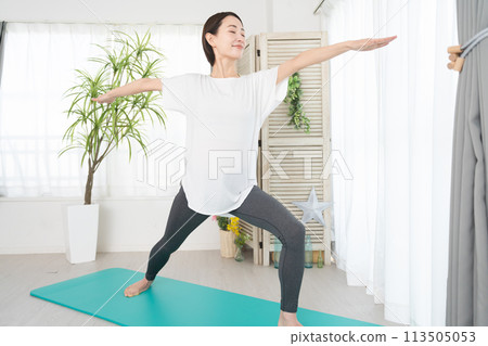Young woman doing yoga poses Beauty image 113505053