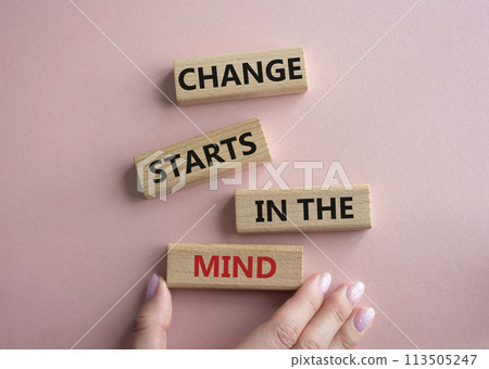 Change starts in the mind symbol. Concept words Change starts in the mind on wooden blocks. Beautiful pink background. Businessman hand. Business and Change starts in the mind concept. Copy space 113505247