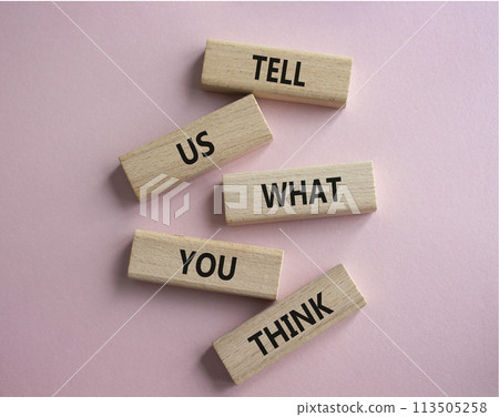Tell us what you think symbol. Wooden blocks with words Tell us what you think. Beautiful pink background. Business and Tell us what you think concept. Copy space. 113505258