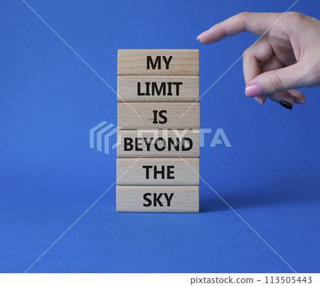 My limit is beyond the sky symbol. Wooden blocks with words My limit is beyond the sky. Beautiful blue background. Businessman hand. Business concept. Copy space. My limit is beyond the sky symbol. Wooden blocks with words My limit is beyond the sky. Beautiful blue background. Businessman hand. Business concept. Copy space. 113505443