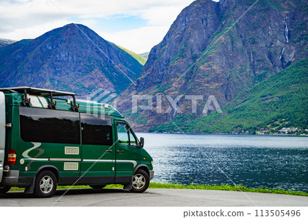 Camper van on norwegian fjord shore 113505496