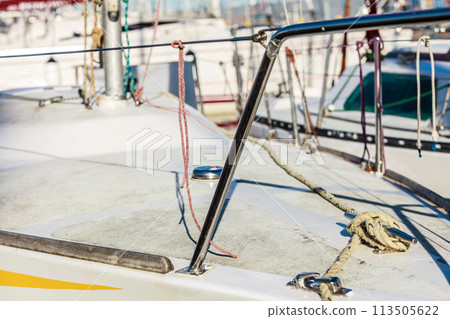 Yachting. Block with rope. Detail of sailing boat Yachting. Block with rope. Detail of sailing boat 113505622