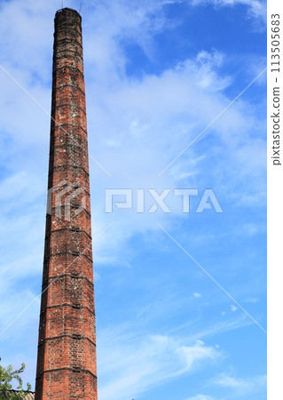 Smokestack of an old abandoned industrial 113505683