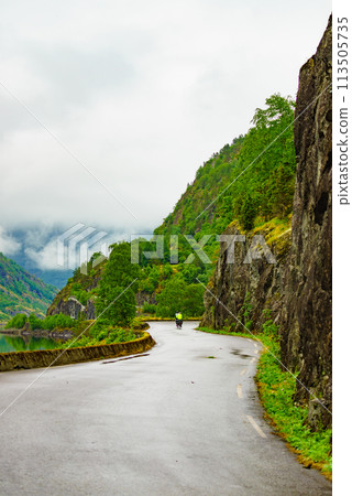 Old road along fjord Eidfjorden, Norway 113505735